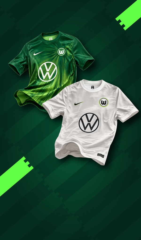 VfL-Wolfsburg-Trikots in Grün und Weiß mit Volkswagen-Logo auf grünem Hintergrund.